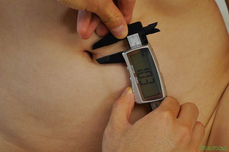 Asian chick Mai Shirakawa shows her big juggs and rubs her pussy