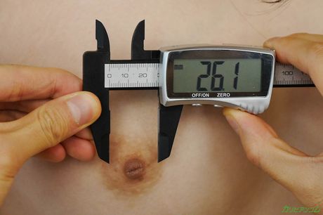 Asian chick Mai Shirakawa shows her big juggs and rubs her pussy