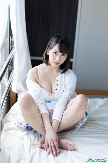 Asian doll Mika Aoki gets her twat stuffed with a big dick