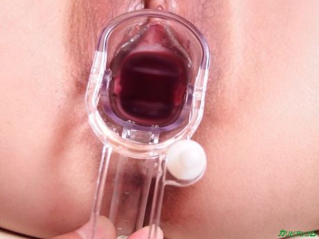 Asian babe Rinka Mizuhara toys her trimmed pussy with a vibrator