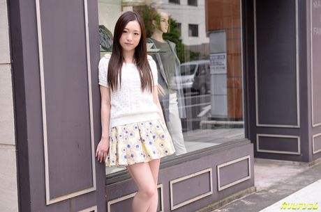 Brown eyed Asian babe Mao Sena gets her face covered in cum after a hard fuck