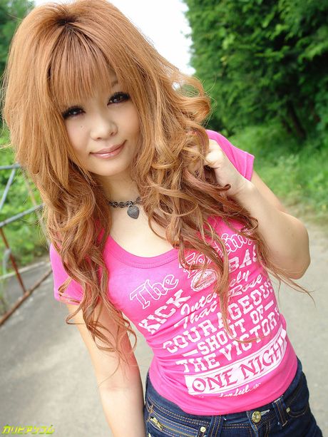 Asian cutie Sarina Tsubaki displays her small tits and toys her twat outdoors