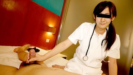 Asian nurse Yuri Saeki gets her twat stuffed with a dildo