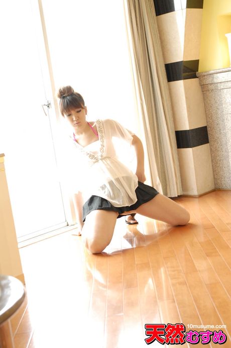 Alluring Asian Yasuda Megumi strips and gets her face and pussy covered in cum