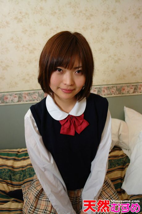 Devastating Asian schoolgirl Mai displays her large boobs and spreads her pussy in a solo