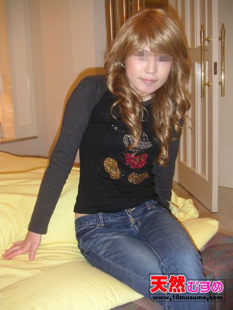 Skinny Asian teen Eri strips to her black panties and displays her bare flesh