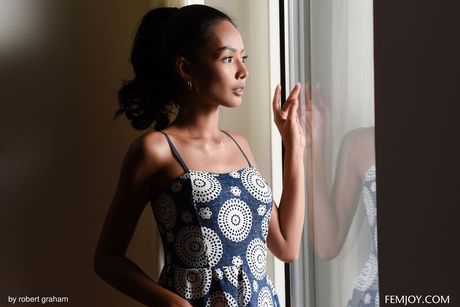 Asian teen Magen Thai removes her dress and displays her hot body