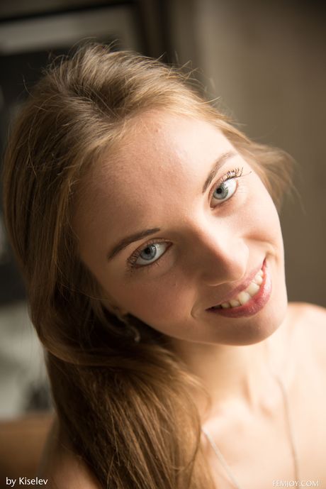 Superb russian teen Vika Lita goes nude on a chair with certainty