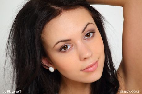 Fantastic russian teen Sheri Vi exhibits her teeny tits and bald pussy in a solo