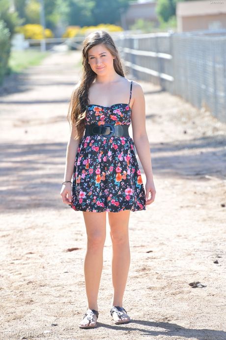 Stunning blonde teen Leila Evans reveals small tits and puts a toy in her cunt outdoor