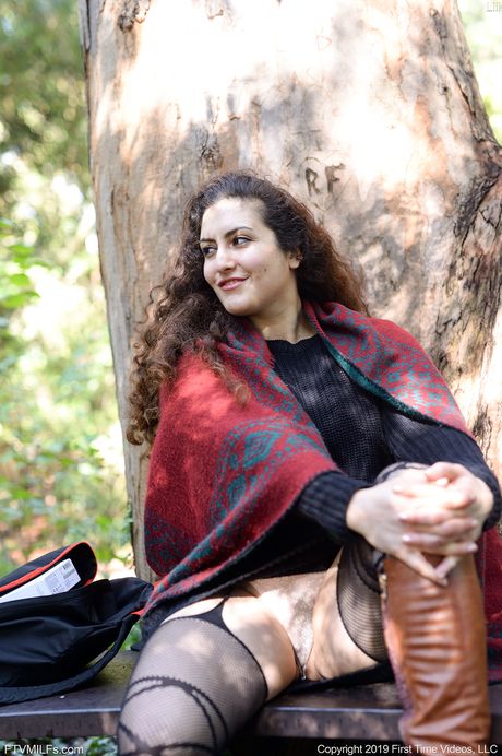 Sexy dutch,lebanese Mommy Lili Miss Arab pleasures her trimmed pussy with a glass dildo