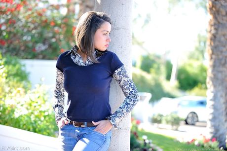 Brunette solo girl Paige strips to her underwear before toying her pussy