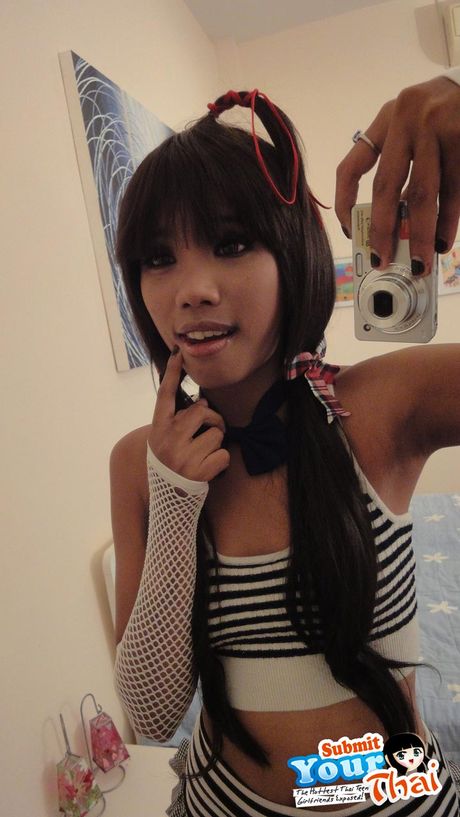 Asian beauty Poy removes her bikini and reveals her tits and ass