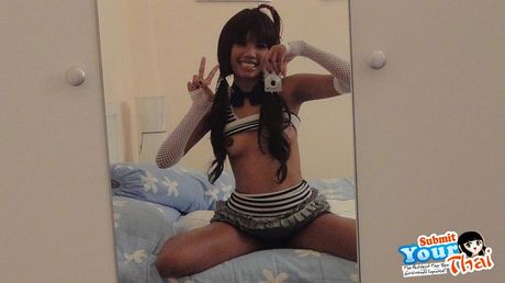 Asian beauty Poy removes her bikini and reveals her tits and ass