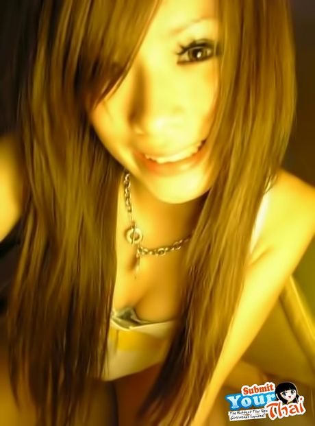 Asian stunner Amateur Girl exhibits her huge tits and poses in a solo