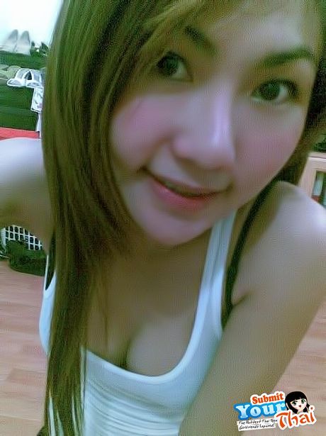 Asian stunner Amateur Girl exhibits her huge tits and poses in a solo