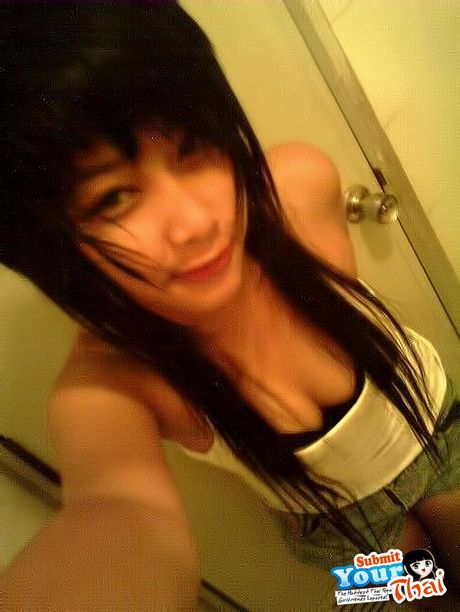 Asian stunner Amateur Girl exhibits her huge tits and poses in a solo