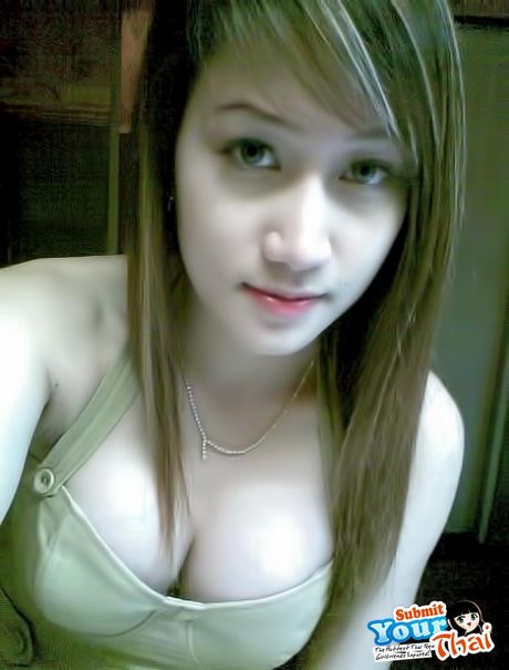 Angelic Asian babe Amateur Girl presents her amazing juggs and poses in a solo