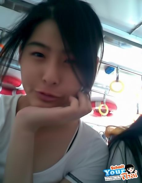 Angelic Asian babe Amateur Girl presents her amazing juggs and poses in a solo