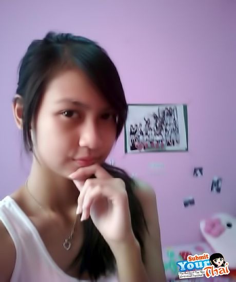 Angelic Asian babe Amateur Girl presents her amazing juggs and poses in a solo