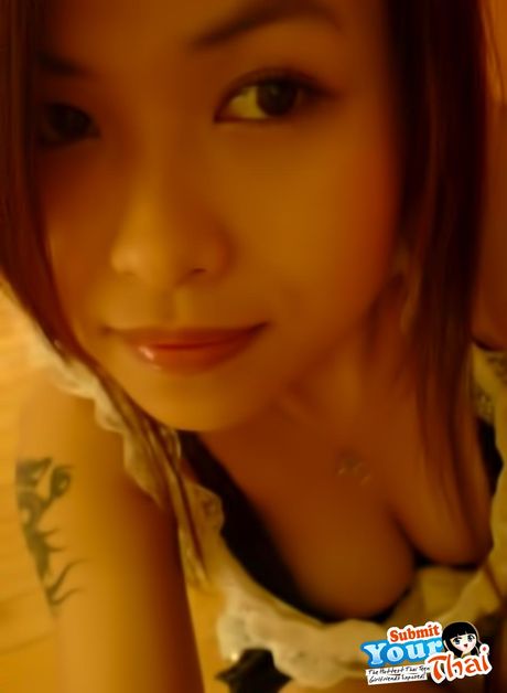 Angelic Asian babe Amateur Girl presents her amazing juggs and poses in a solo