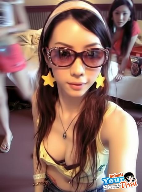 Asian doll Amateur Girl gets naked in a black dress and sunglasses