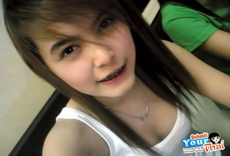 Asian beauty Amateur Girl reveals her petite tits and poses in a solo