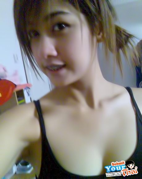 Asian beauty Amateur Girl reveals her petite tits and poses in a solo