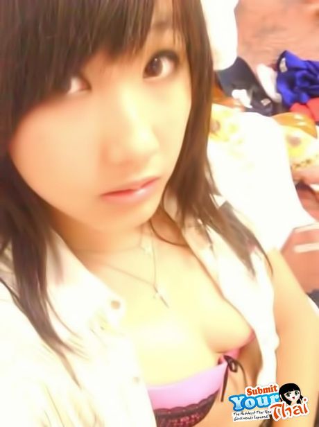 Asian beauty Amateur Girl reveals her petite tits and poses in a solo