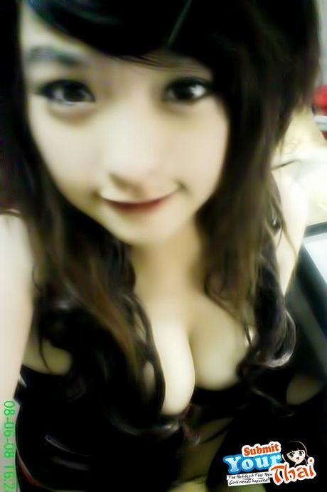 Asian covergirl Amateur Girl highlights her amazing melons and poses in a solo