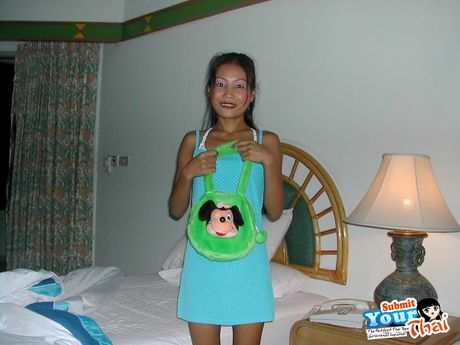 Asian cutie Amateur Girl models naked on a bed boldly