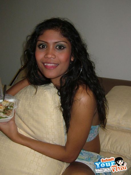 Black hair Amateur Girl displays her nice tits and poses in black stockings