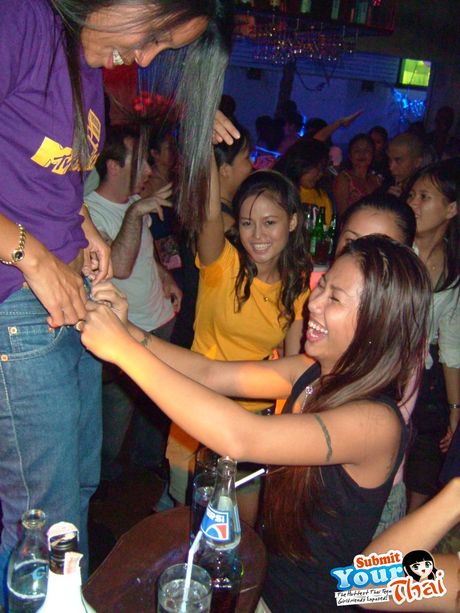 Black hair Amateur Girl displays her nice tits and poses in black stockings