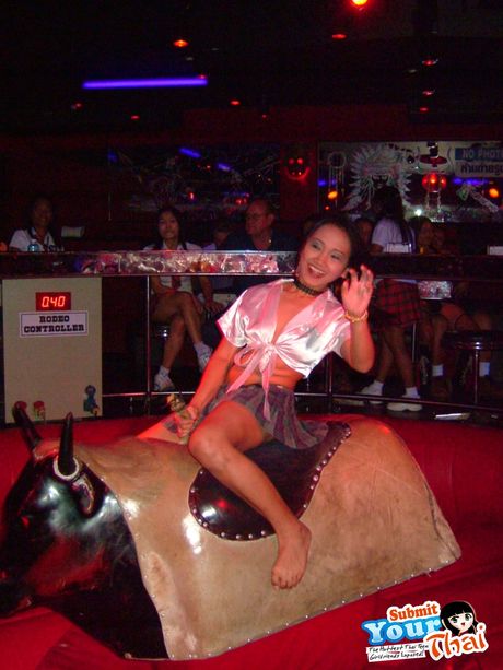 Black hair Amateur Girl displays her nice tits and poses in black stockings