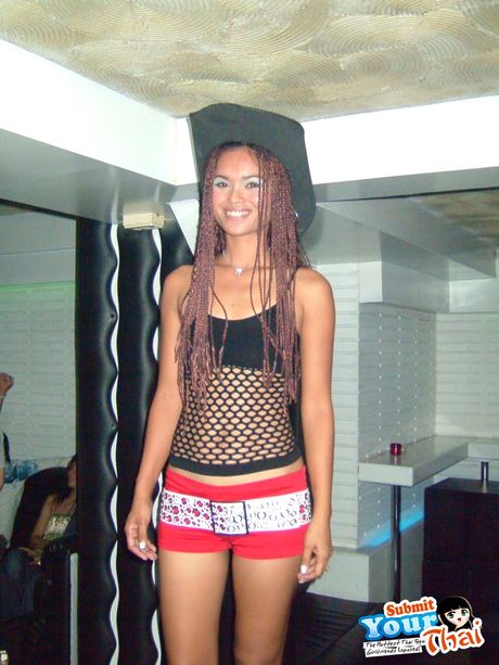 Black hair Amateur Girl displays her nice tits and poses in black stockings