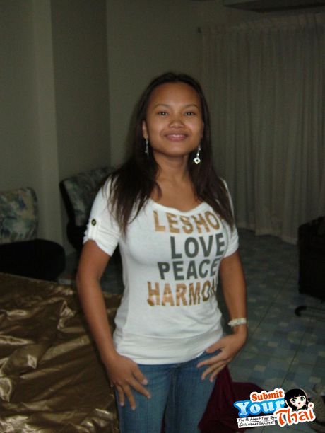 Black hair Amateur Girl displays her nice tits and poses in black stockings