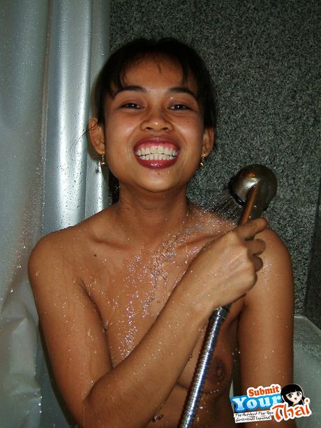 Black haired Amateur Girl presents her natural tits and bald pussy