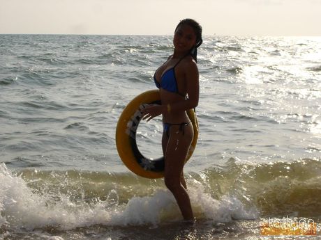 Asian amateur Tailynn reveals her tiny boobs and poses in a bikini