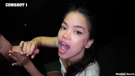 Asian girl Angelina Moon sucks a dick through a gloryhole