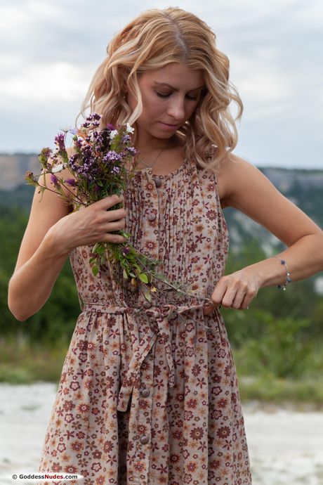 Blond russian doll Betty Swan bares it all on a blanket in a forest