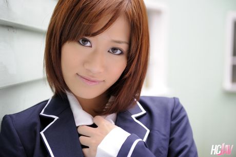 Schoolgirl Maki Otoha masturbates with a vibrator in her bedroom