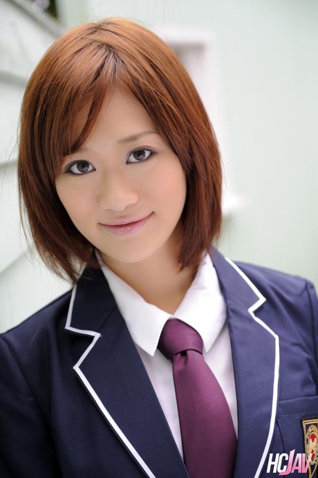 Schoolgirl Maki Otoha masturbates with a vibrator in her bedroom