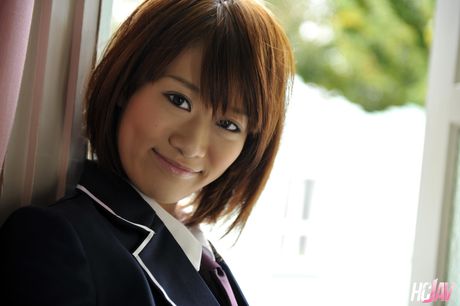 Schoolgirl Maki Otoha masturbates with a vibrator in her bedroom