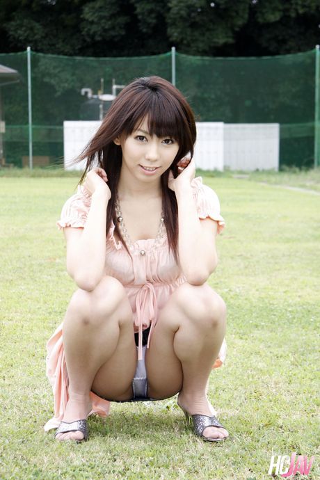 Asian girl Maho Sawai plays with her pussy in a backyard