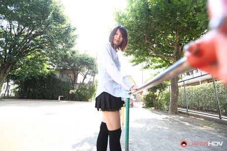 Asian beauty Yukari Sawada strips to her stockings and flaunts her natural tits
