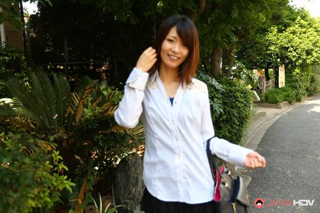 Asian beauty Yukari Sawada strips to her stockings and flaunts her natural tits