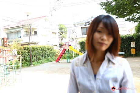 Asian beauty Yukari Sawada strips to her stockings and flaunts her natural tits