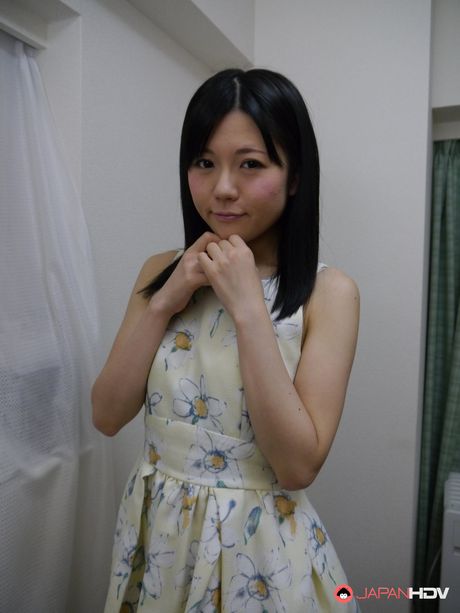 Sexy Asian girl Mai Araki displays her small tits and bald pussy in a solo