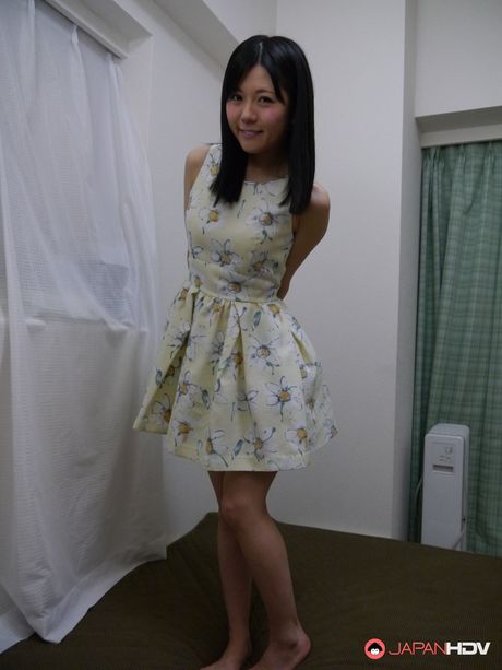 Sexy Asian girl Mai Araki displays her small tits and bald pussy in a solo