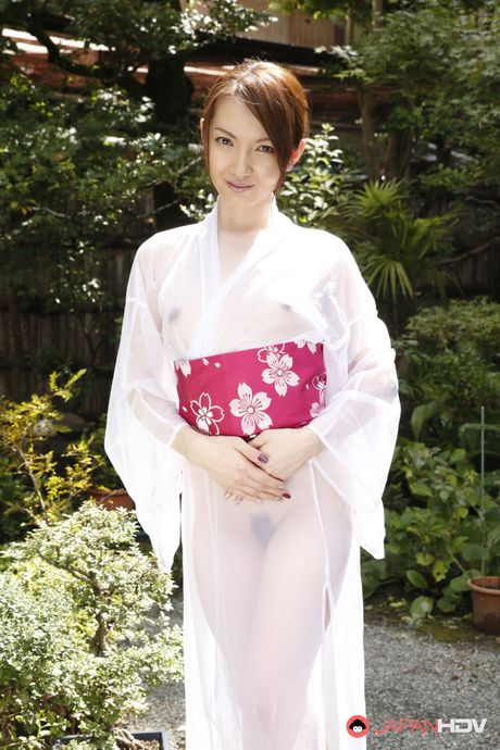 Excellent Asian babe Hitomi Hayama shows her hot butt and her trimmed pussy